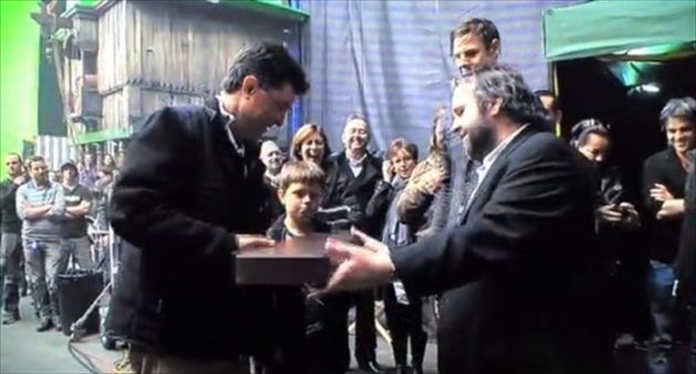 director-peter-jackson-right-gives-stephen-colbert-a-prop-version-of-the-hobbit-sword-sting-village-voice-800x430